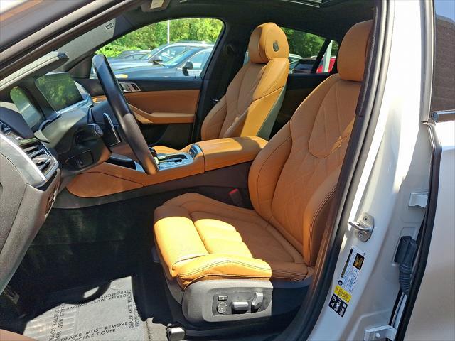 used 2023 BMW X6 car, priced at $55,412