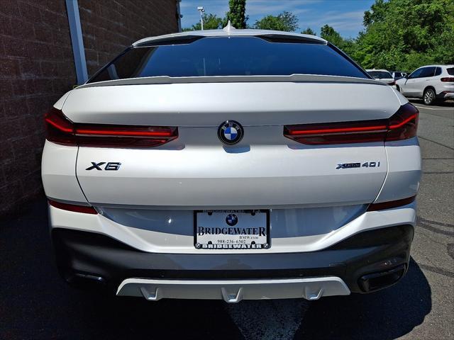 used 2023 BMW X6 car, priced at $55,412