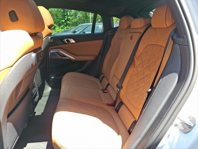 used 2023 BMW X6 car, priced at $55,412