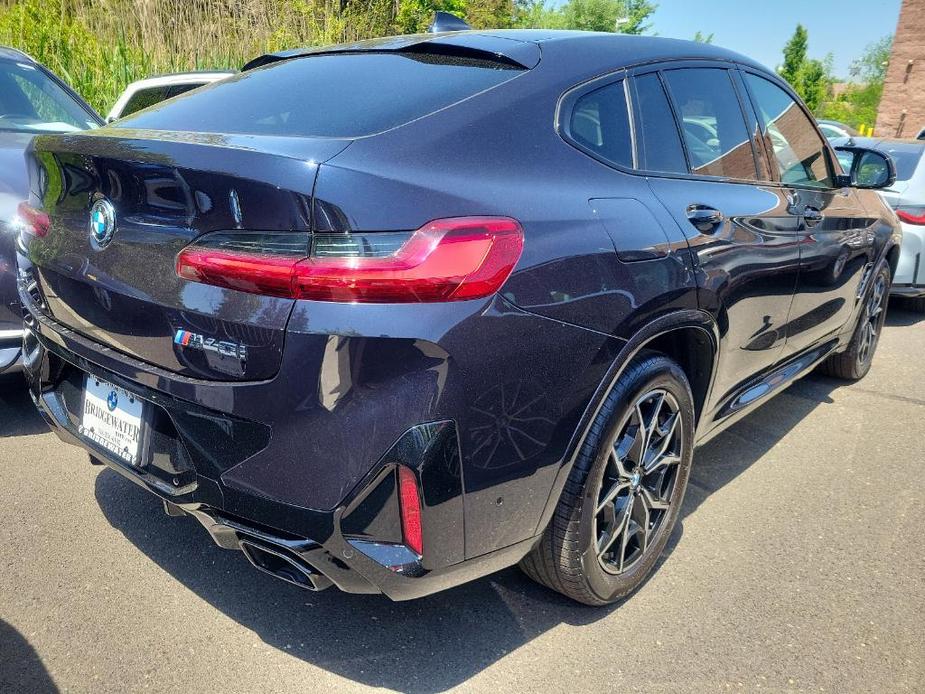 used 2024 BMW X4 car, priced at $66,877