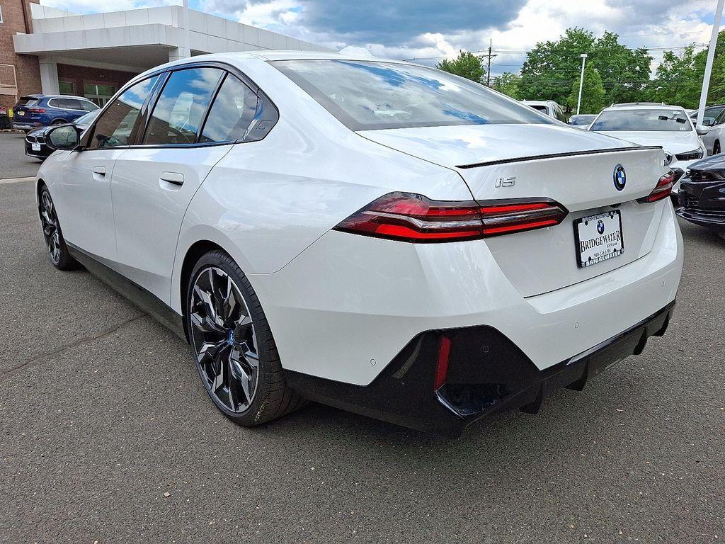 used 2024 BMW i5 car, priced at $68,797