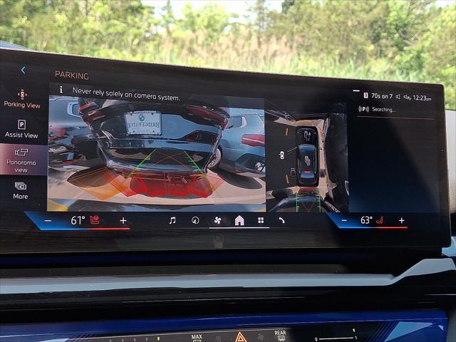 used 2024 BMW i5 car, priced at $63,988