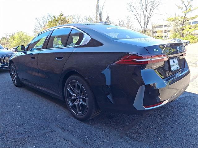used 2025 BMW i5 car, priced at $68,997