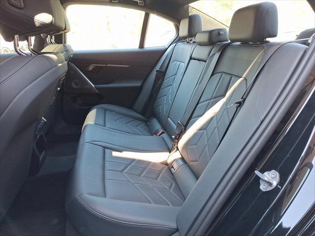 used 2025 BMW i5 car, priced at $68,997