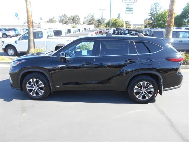 used 2021 Toyota Highlander Hybrid car, priced at $32,995