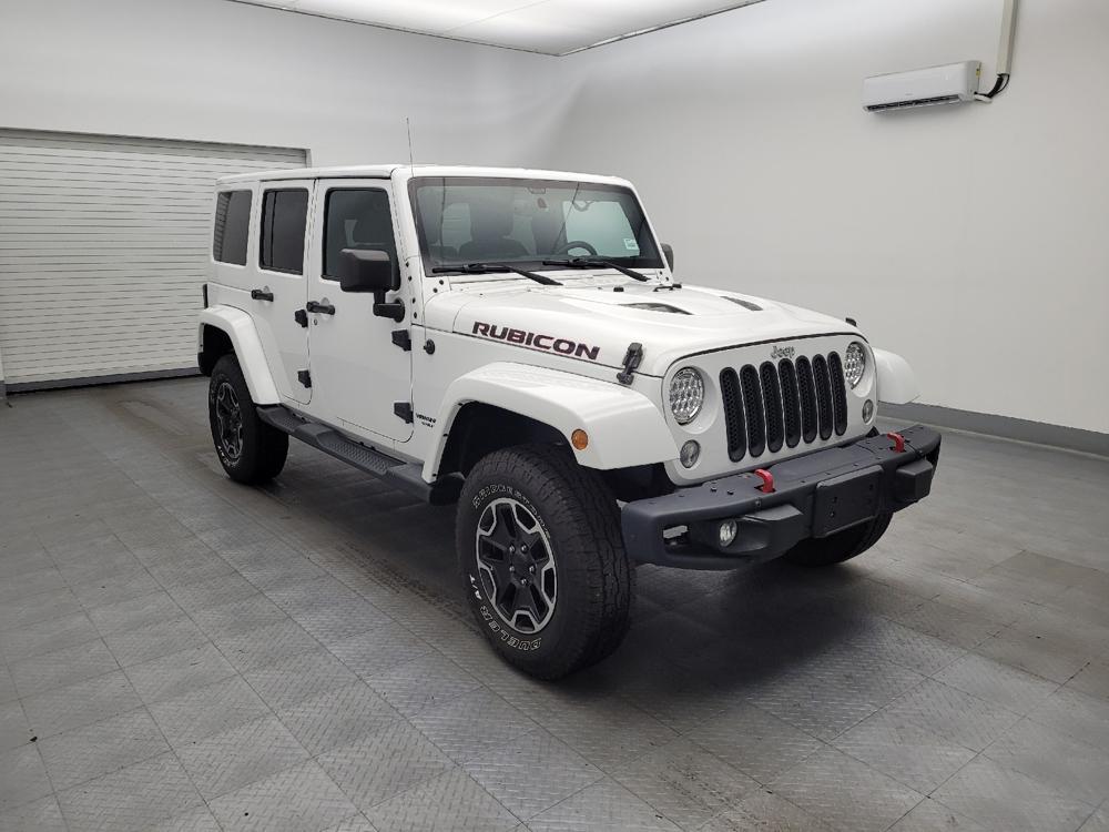 used 2015 Jeep Wrangler Unlimited car, priced at $23,395