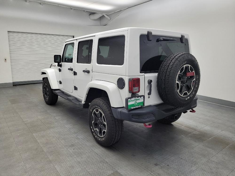 used 2015 Jeep Wrangler Unlimited car, priced at $23,395