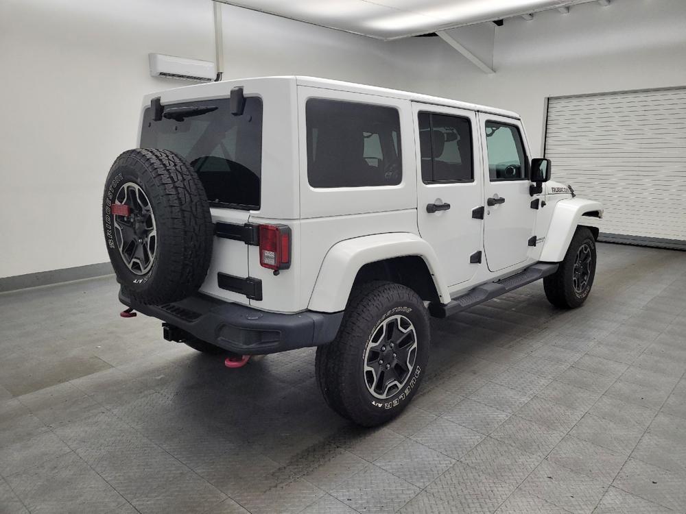 used 2015 Jeep Wrangler Unlimited car, priced at $23,395