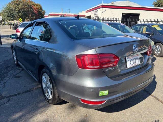 used 2013 Volkswagen Jetta Hybrid car, priced at $9,497
