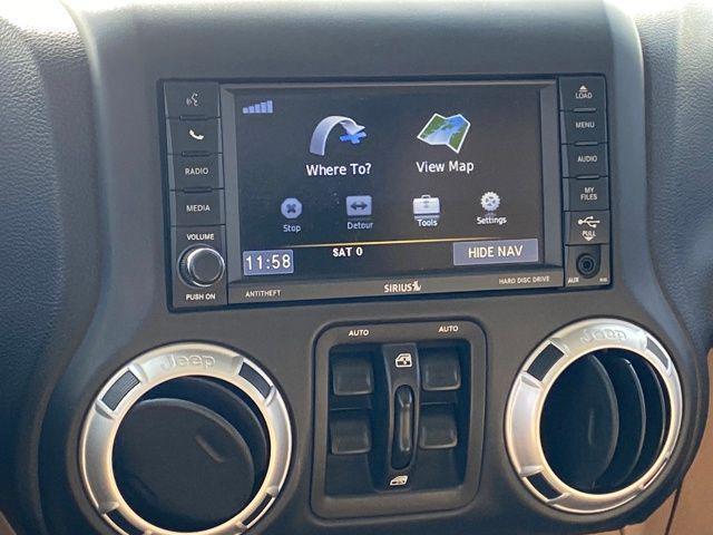 used 2014 Jeep Wrangler Unlimited car, priced at $20,600