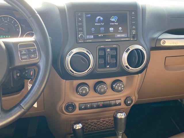 used 2014 Jeep Wrangler Unlimited car, priced at $20,600