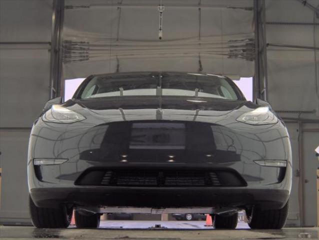 used 2024 Tesla Model Y car, priced at $33,699