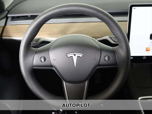 used 2024 Tesla Model Y car, priced at $33,479