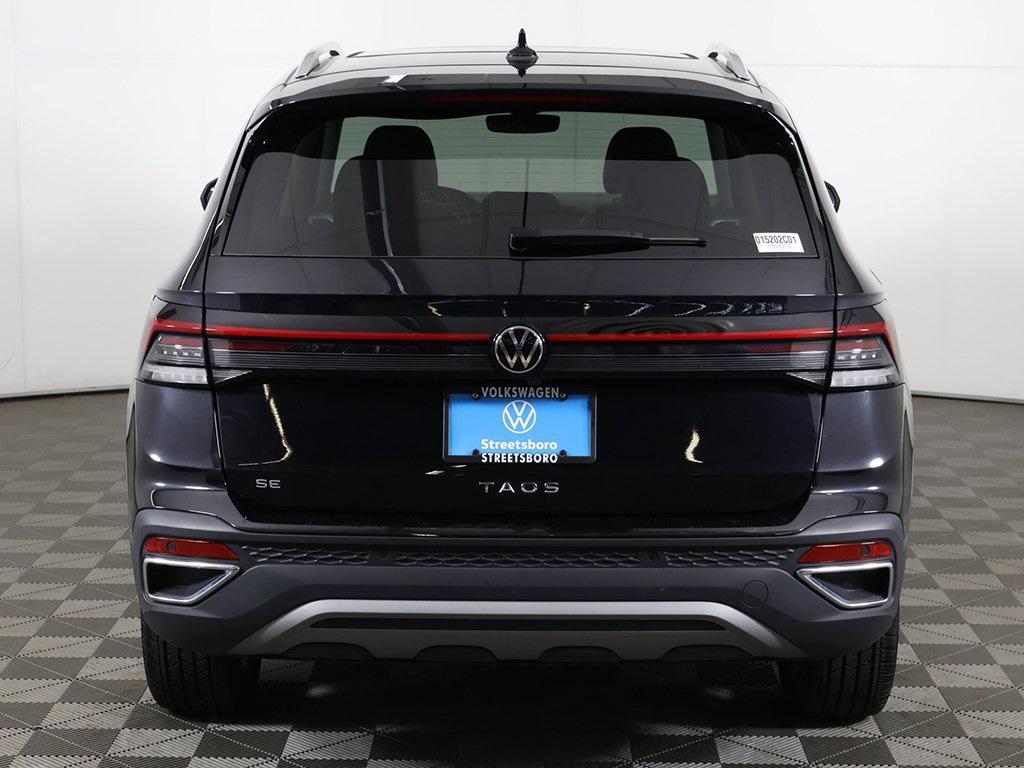 used 2025 Volkswagen Taos car, priced at $22,599
