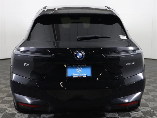 used 2024 BMW iX car, priced at $56,999