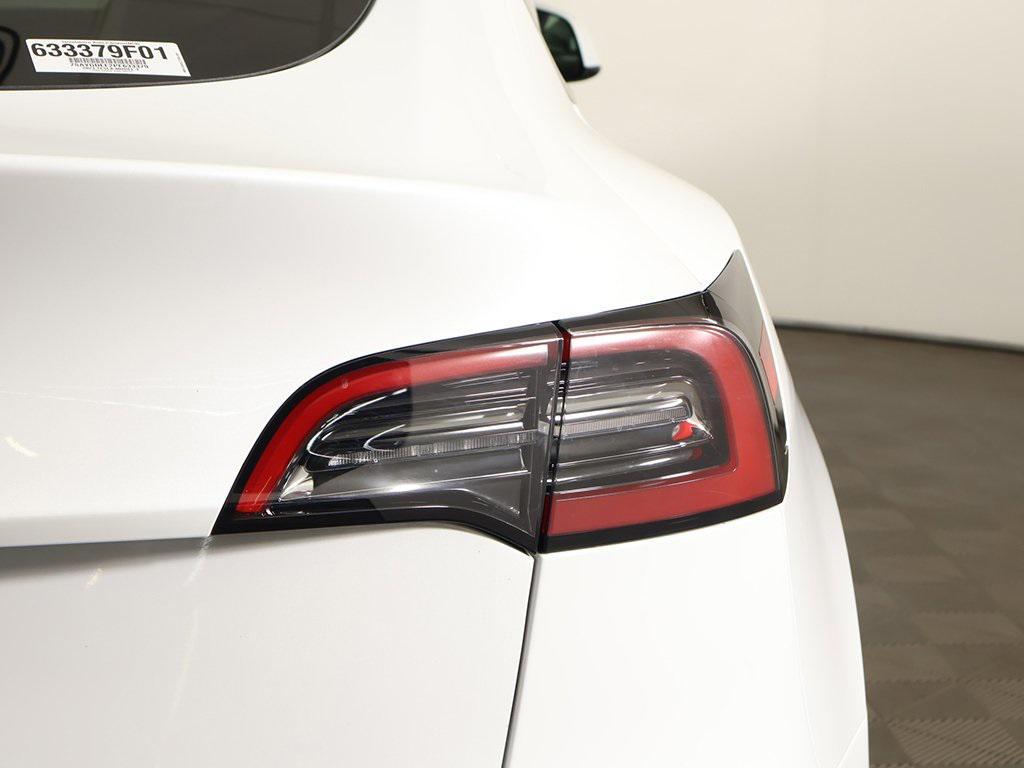 used 2023 Tesla Model Y car, priced at $30,559