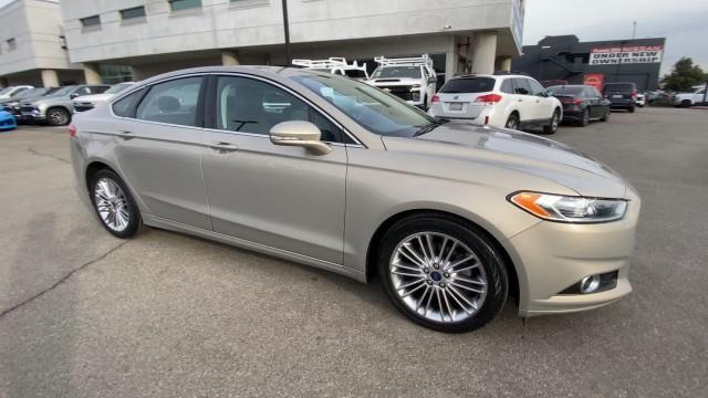 used 2015 Ford Fusion car, priced at $9,995