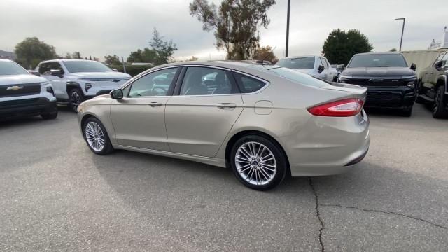 used 2015 Ford Fusion car, priced at $9,995