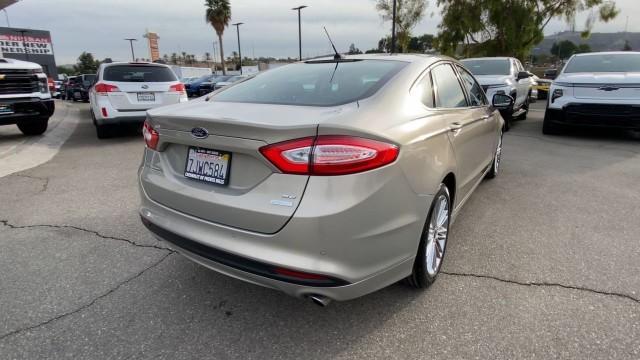 used 2015 Ford Fusion car, priced at $9,995