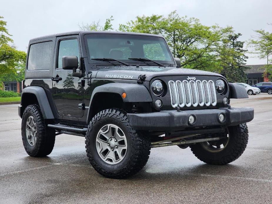 used 2014 Jeep Wrangler car, priced at $21,337
