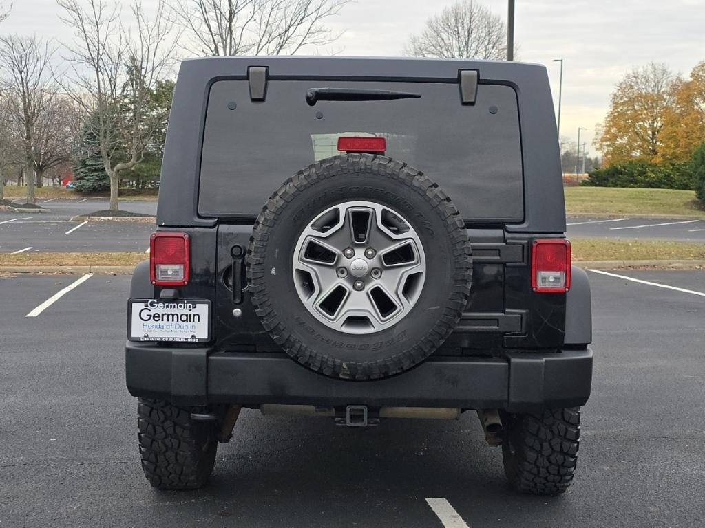 used 2013 Jeep Wrangler Unlimited car, priced at $18,977