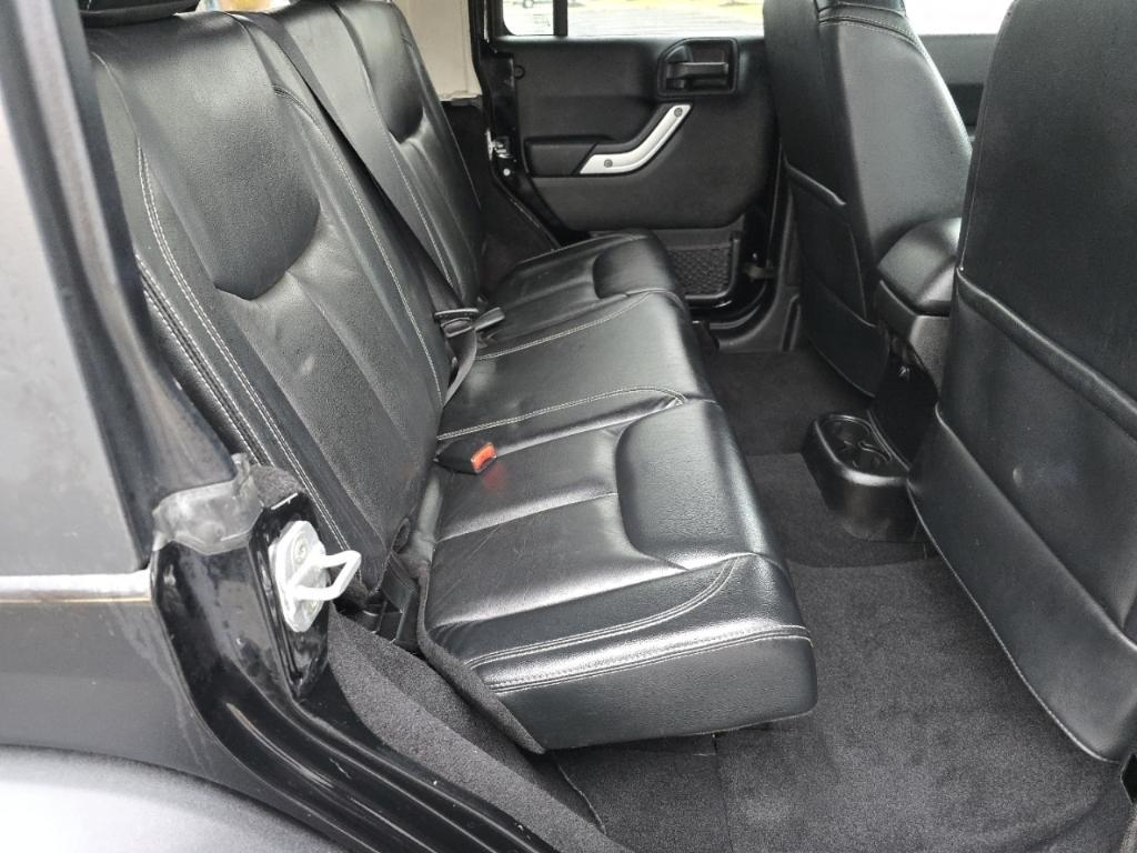 used 2013 Jeep Wrangler Unlimited car, priced at $18,977