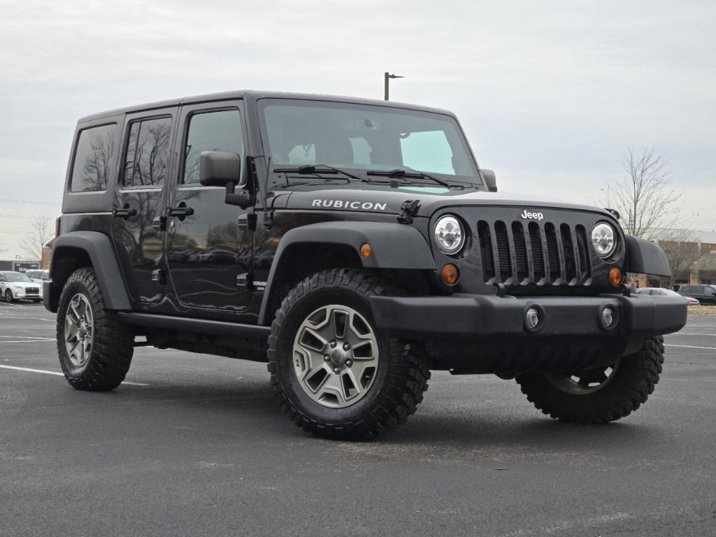 used 2013 Jeep Wrangler Unlimited car, priced at $18,977