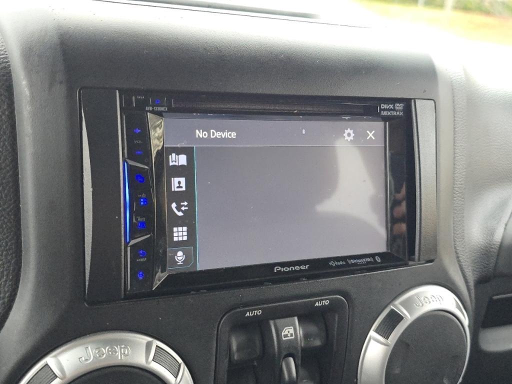 used 2013 Jeep Wrangler Unlimited car, priced at $18,977