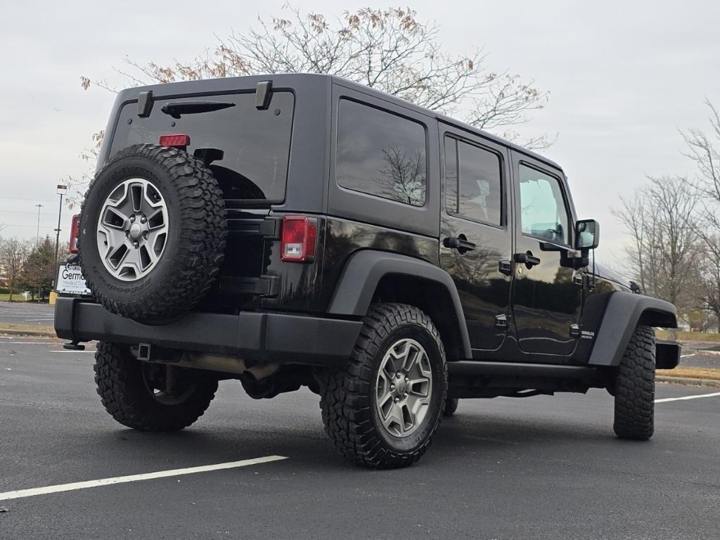 used 2013 Jeep Wrangler Unlimited car, priced at $18,977