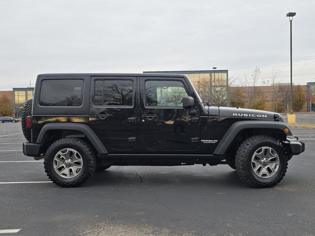 used 2013 Jeep Wrangler Unlimited car, priced at $18,977