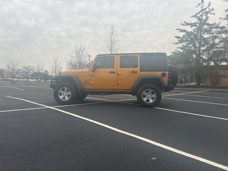 used 2014 Jeep Wrangler Unlimited car, priced at $19,500