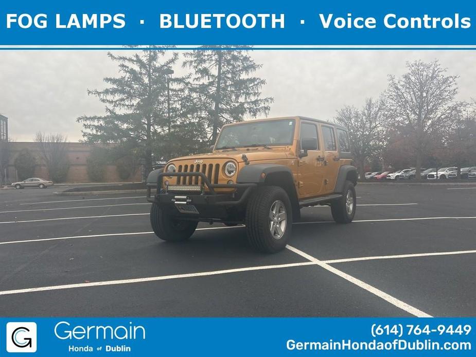 used 2014 Jeep Wrangler Unlimited car, priced at $19,500