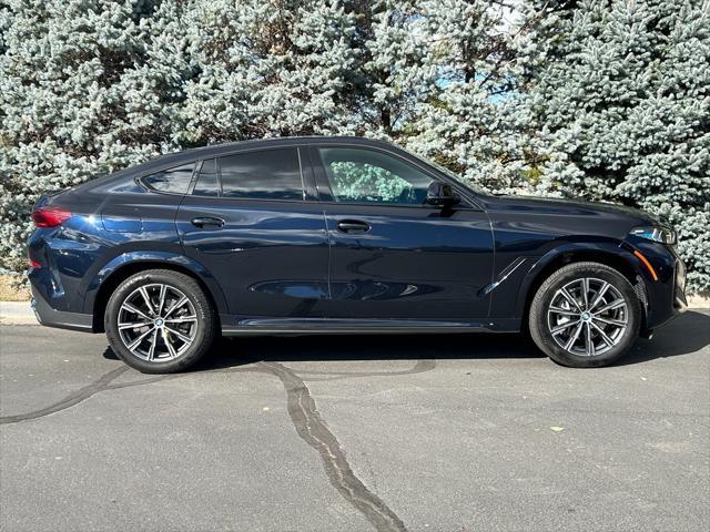 used 2024 BMW X6 car, priced at $59,950