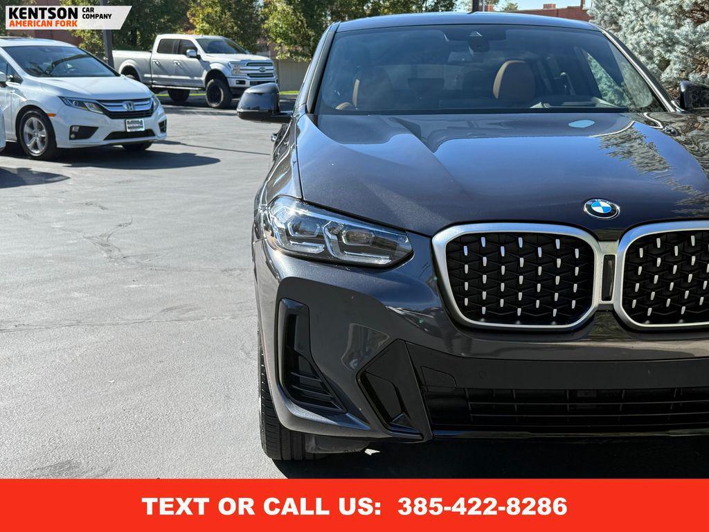 used 2025 BMW X4 car, priced at $49,950