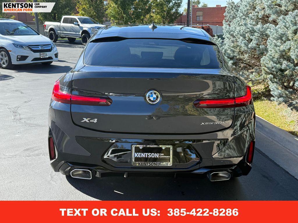 used 2025 BMW X4 car, priced at $49,950