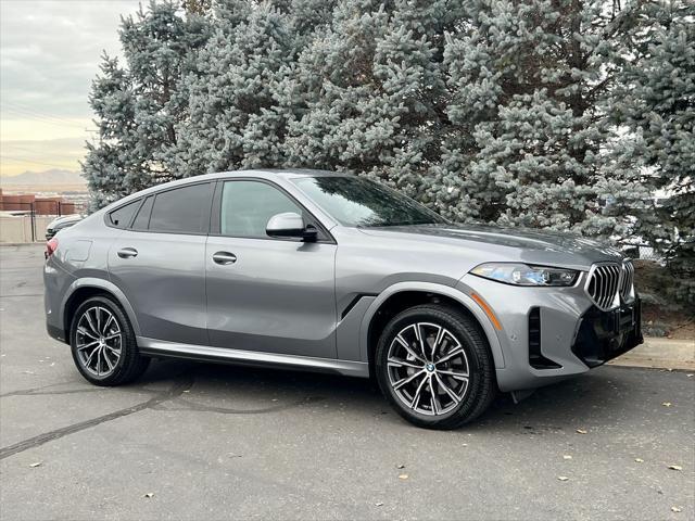 used 2025 BMW X6 car, priced at $68,950