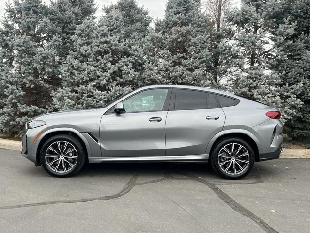 used 2025 BMW X6 car, priced at $68,950