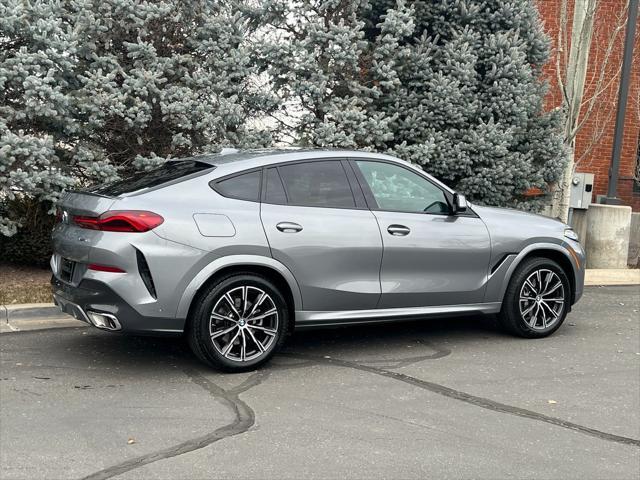 used 2025 BMW X6 car, priced at $68,950