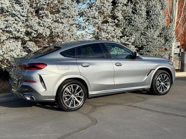 used 2024 BMW X6 car, priced at $61,950