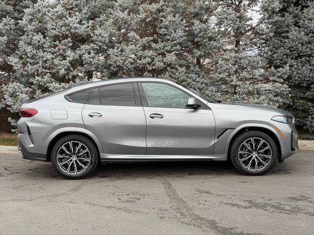 used 2025 BMW X6 car, priced at $68,950