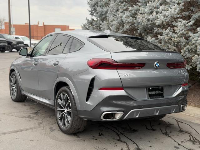 used 2025 BMW X6 car, priced at $68,950