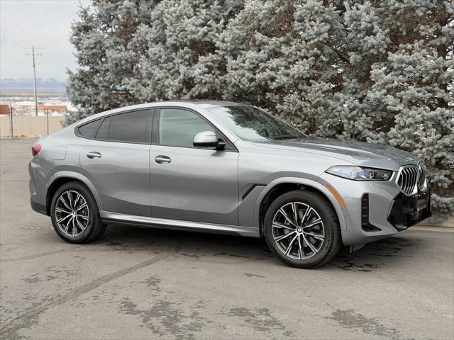 used 2025 BMW X6 car, priced at $68,950