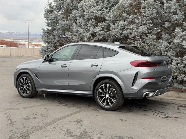 used 2025 BMW X6 car, priced at $68,950