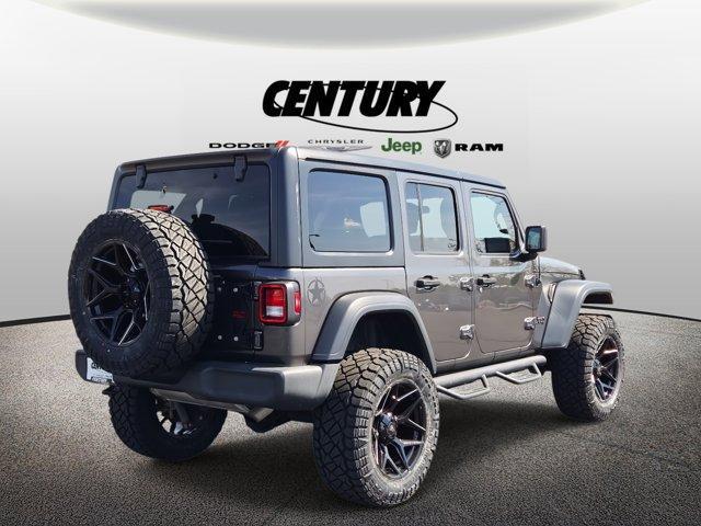 used 2021 Jeep Wrangler Unlimited car, priced at $33,977