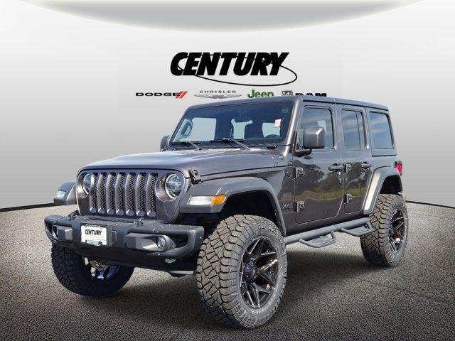 used 2021 Jeep Wrangler Unlimited car, priced at $33,977