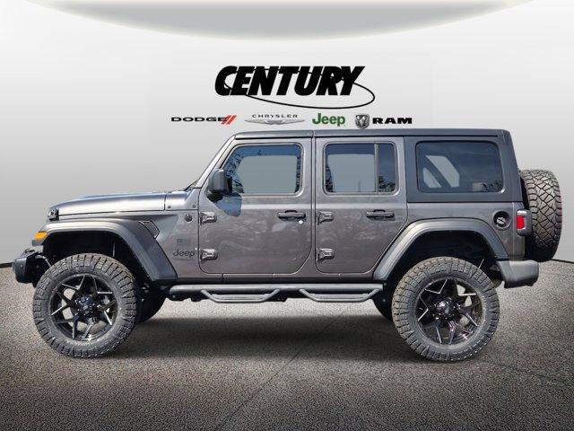used 2021 Jeep Wrangler Unlimited car, priced at $33,977