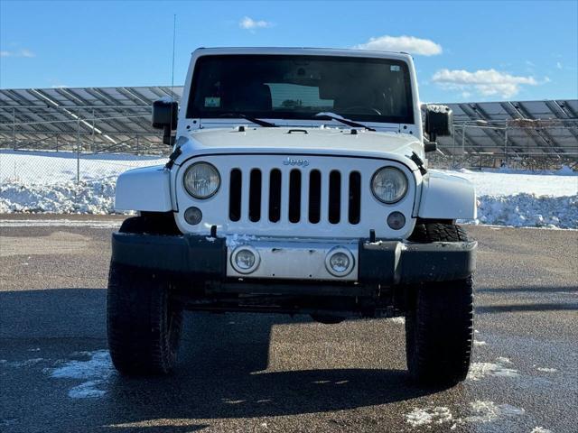 used 2014 Jeep Wrangler Unlimited car, priced at $13,975