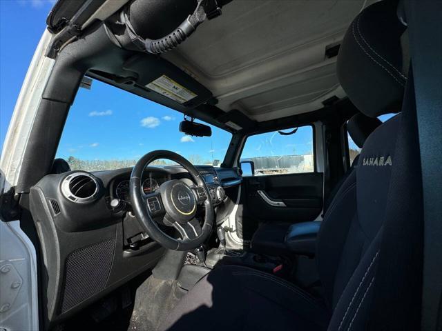 used 2014 Jeep Wrangler Unlimited car, priced at $13,975