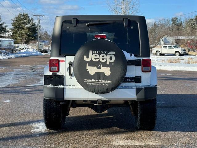 used 2014 Jeep Wrangler Unlimited car, priced at $13,975