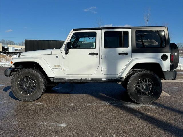 used 2014 Jeep Wrangler Unlimited car, priced at $13,975